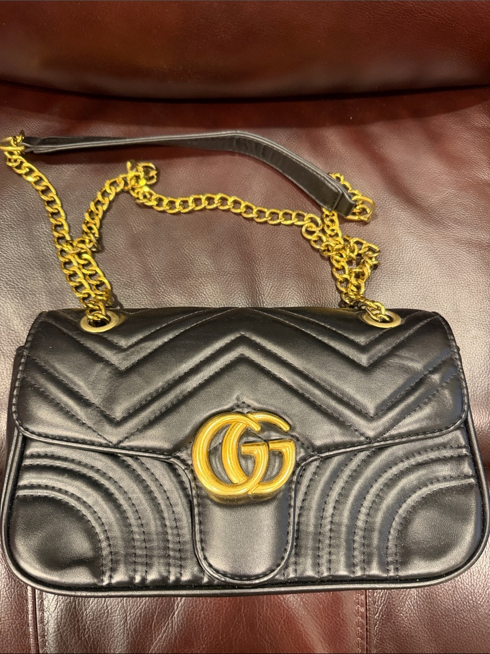 Black Quilted Leather Crossbody Bag with Gold Double-G Accent